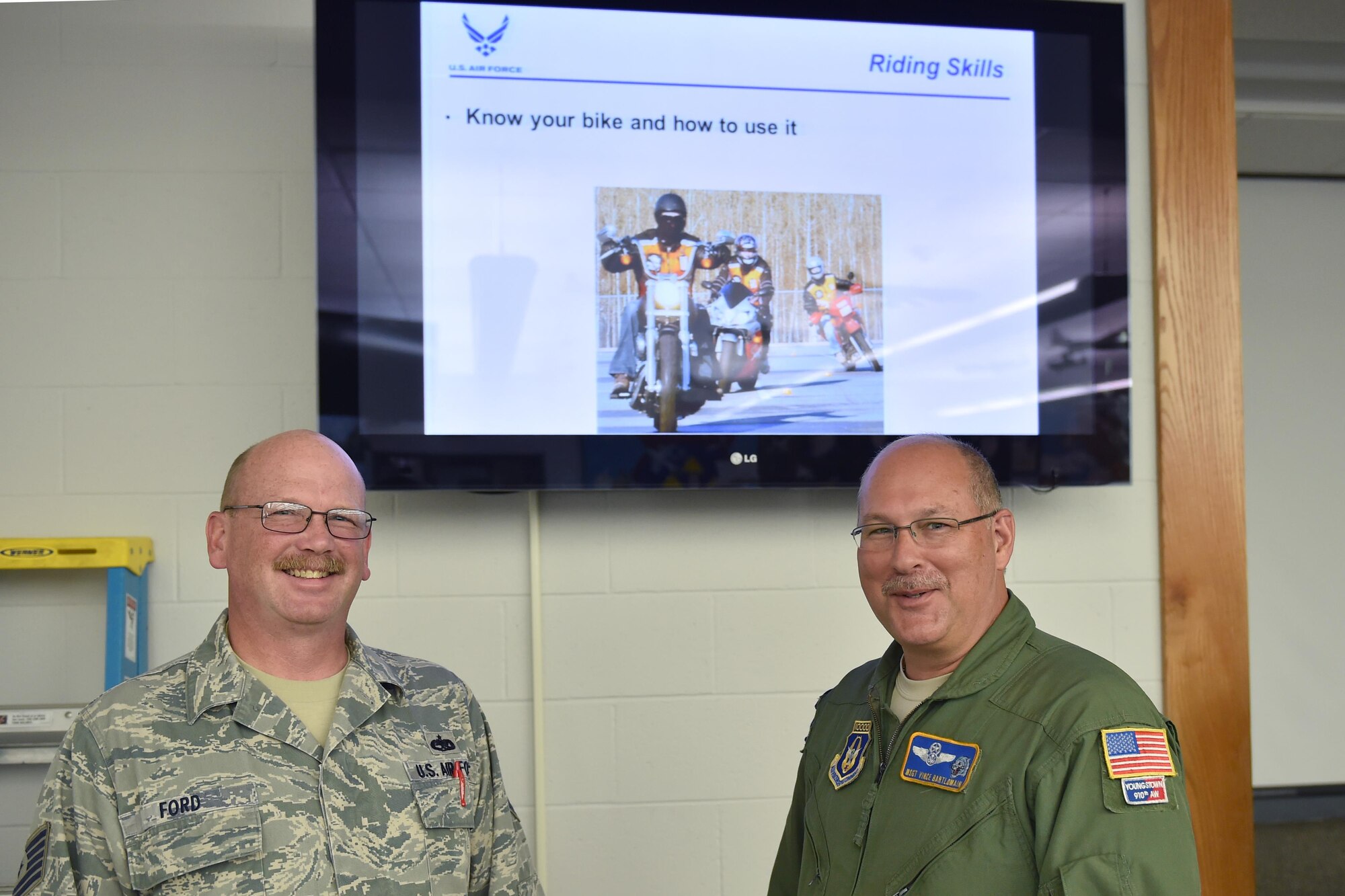 Air Force Reserve Tech. Sgt. Andy Ford and Master Sergeant Vince Bartlomain teach the Motorcycle Safety Course for the 910th Airlift Wing safety office here June 7, 2015. Ford works for both safety and the 910th Maintenance Squadron Avionics shop. Bartlomain is a C-130 Aircraft flight engineer for the 757th Airlift Squadron. U.S. Air Force photo/Tech. Sgt. Jim Brock.