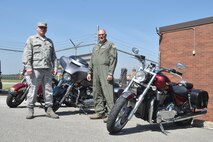 Air Force Reserve Tech. Sgt. Andy Ford and Master Sergeant Vince Bartlomain pose in front of their motorcycles here, June 7, 2015. Ford and Bartlomain teach the Motorcycle Safety Course for the 910th Airlift Wing safety office here. Ford works for both safety and the 910th Maintenance Squadron Avionics shop. Bartlomain is a C-130 Aircraft flight engineer for the 757th Airlift Squadron. U.S. Air Force photo/Tech. Sgt. James Brock