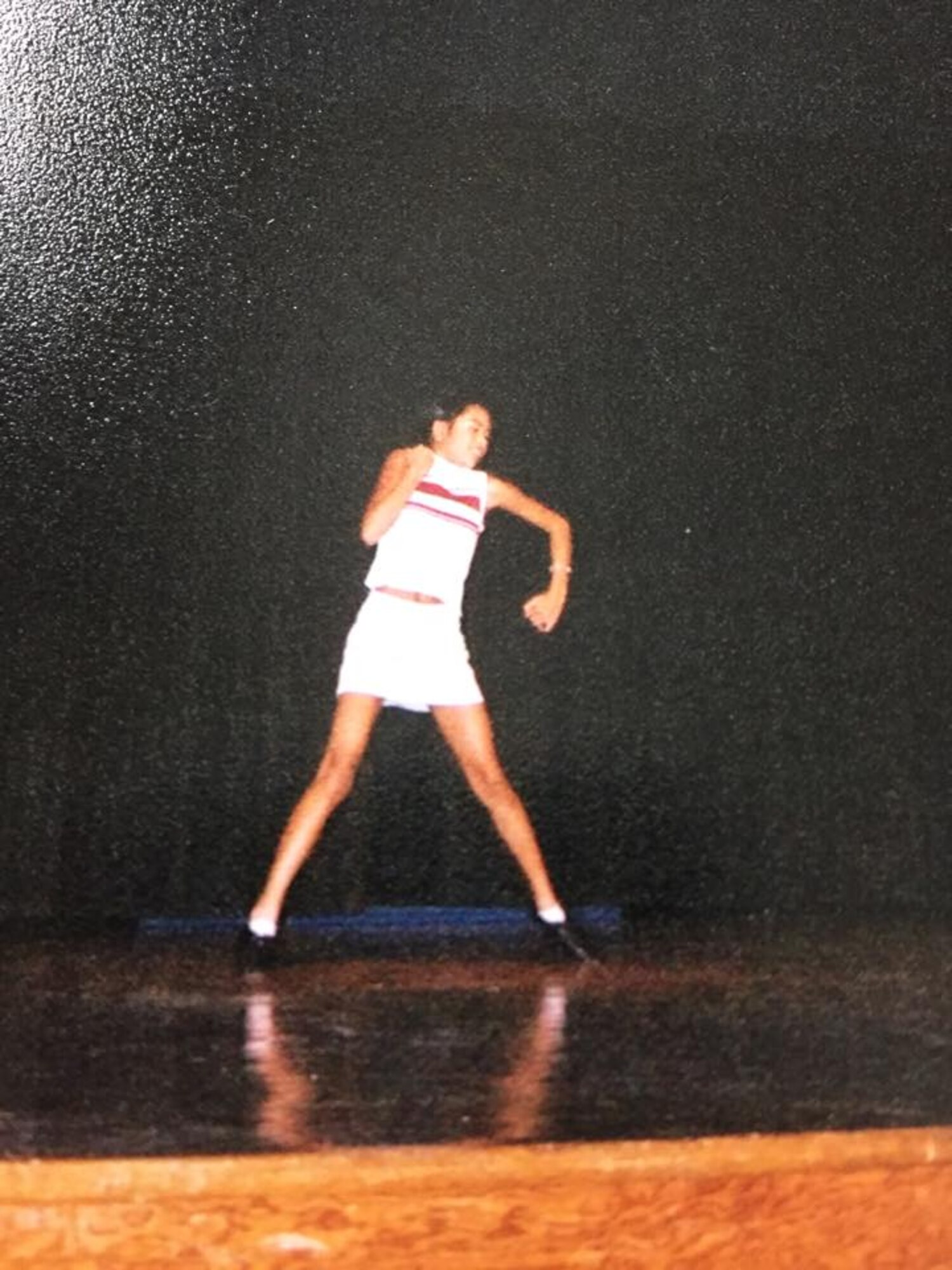 Senior Airman Jessica Turney, 374th Operations Support Squadron air traffic controller, dances during her first stage performance while in middle school at Virginia Beach, Virginia, 2005. In school, Turney was never good at sports, but says that dance came easy to her. (Courtesy photo)