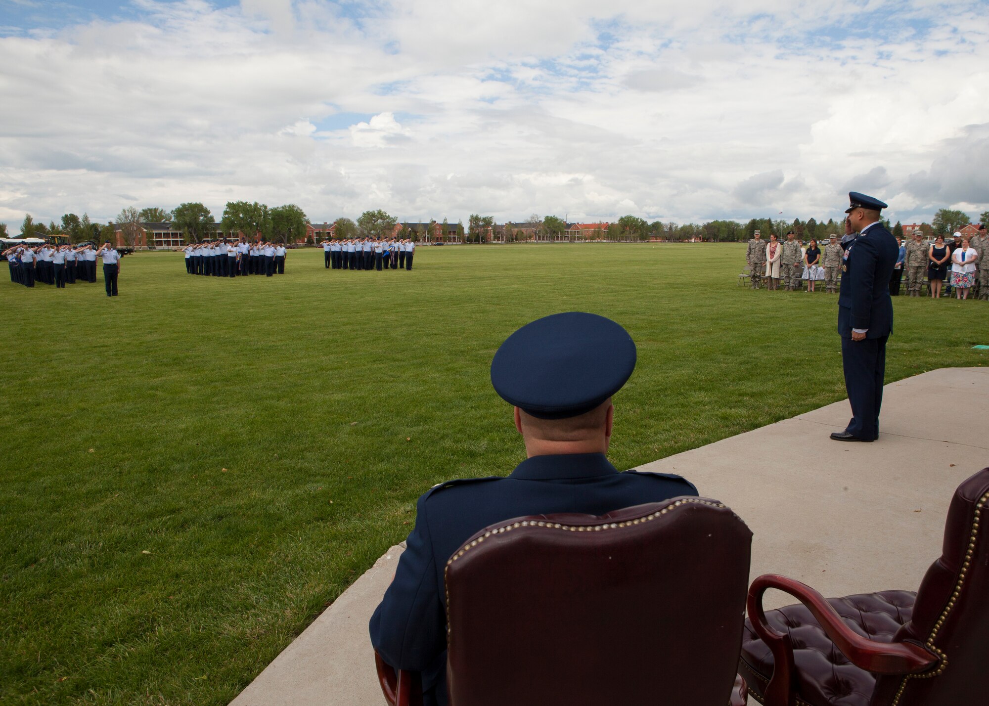 Col. Frank R. Verdugo returns his first salute to 90th Mission Support Group Airmen during a change-of-command ceremony on the Argonne Parade Field, F.E. Warren Air Force Base, Wyo., June 11, 2015. Prior to assuming command of the group, Verdugo was chief of Financial Analysis Division, Headquarters Air Force Space Command, Colorado Springs, Colo.