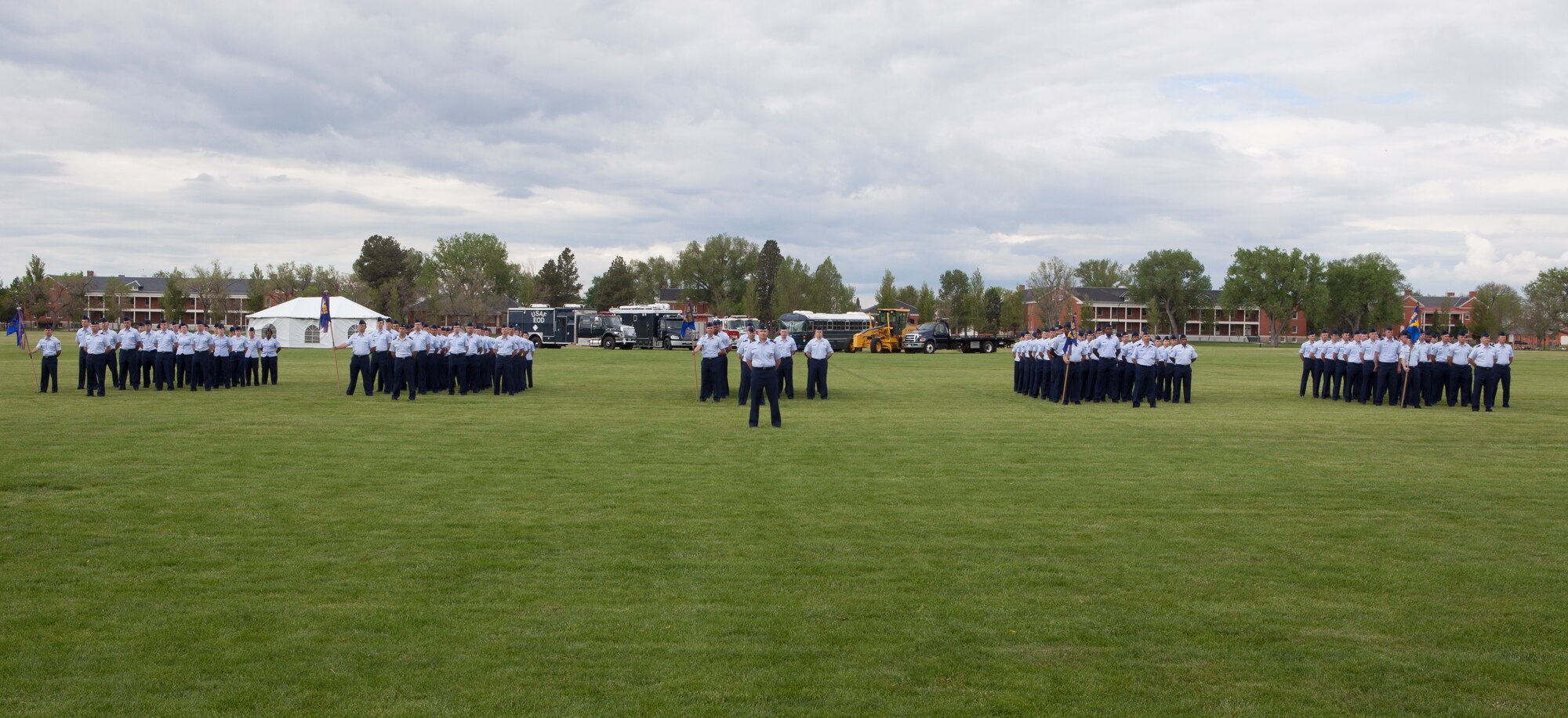 Airmen of the 90th Mission Support Group stand in formation on Argonne Parade Field, F.E. Warren Air Force Base, Wyo., June 11, 2015, prior to the 90th MSG change-of-command ceremony. The group is comprised of a 90th Logistics Readiness Squadron, 90th Civil Engineer Squadron, 90th Force Support Squadron, 90th Communications Squadron, and 90th Contracting Squadron, which provide essential functions to support the 90th Missile Wing mission. 