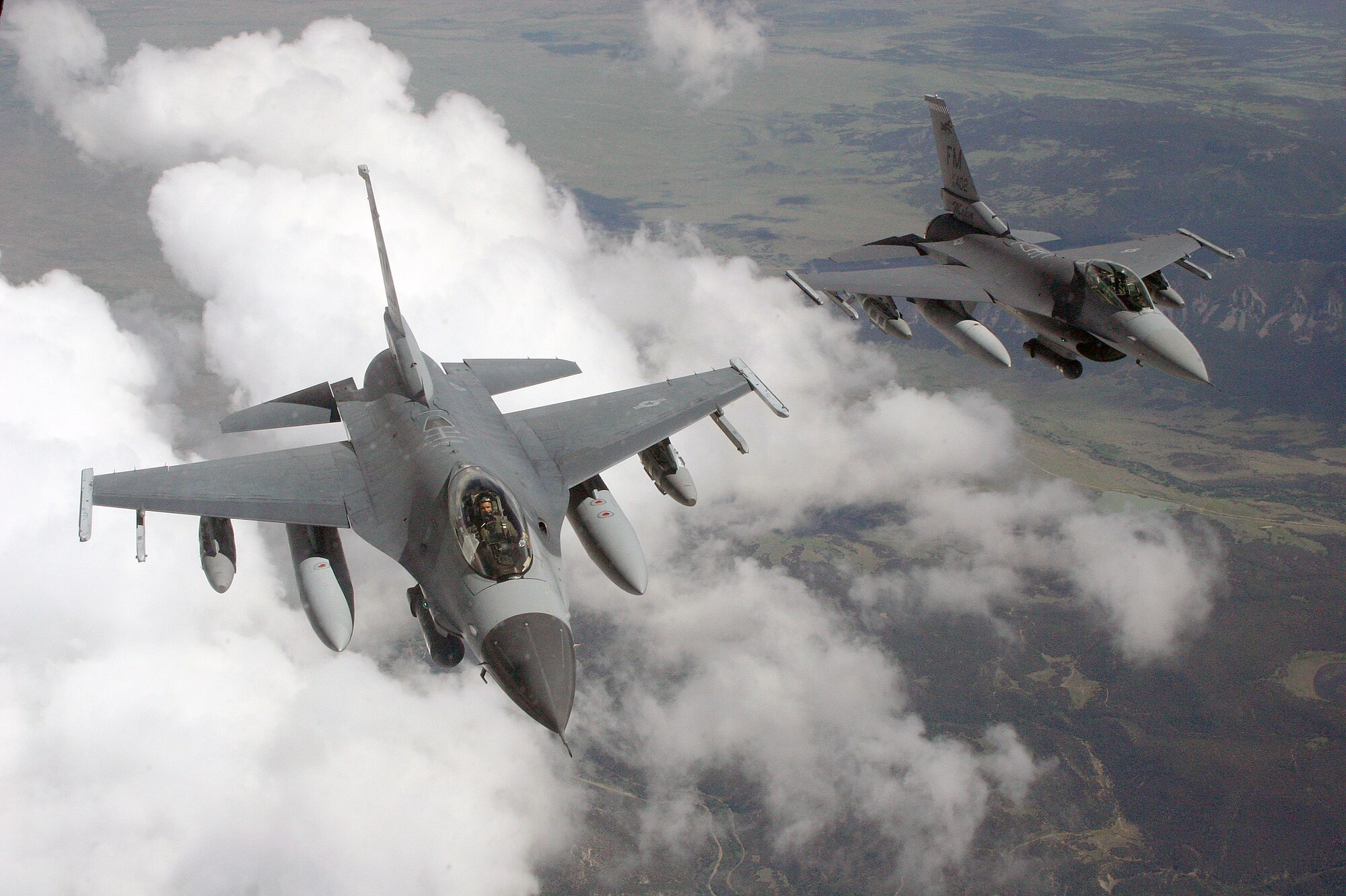 Two F-16 jets (like the ones pictured) from the 482nd Fighter Wing, Homestead Air Reserve Base, Fla., roared over former Capt. Walter Wyatt's house coincidentally as his family prepared to take him to the funeral home on June 8. Wyatt served as a decorated U.S. Army Air Forces fighter pilot in World War II and flew with the famed Flying Tigers. The jets were returning to base after a local training mission. (U.S. Air Force picture)
