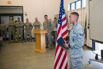 U.S. Air Force Senior Airman Marc Rees, 822d Base Defense Squadron fireteam member, thanks fellow 822d BDS members for their encouragement throughout his journey at Moody after receiving an U.S. Air Force Academy admission certificate during an awards ceremony June 10, 2015, at Moody Air Force Base, Ga. Rees was one of 240 accepted into the USAFA out of 9,000 applicants. (U.S. Air Force photo by Airman Greg Nash/Released)  
