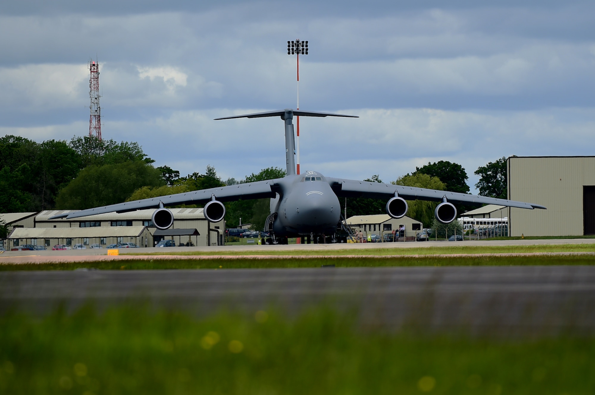 A C-5 Super Galaxy takes off from RAF Fairford, United Kingdom, June 3, 2015, after dropping off cargo in support of U.S. European Command Exercises BALTOPS 15 and SABER STRIKE 15 from June 5-21, 2015. The deployment of U.S. bombers to RAF Fairford, which was coordinated with USEUCOM and NATO, demonstrates the U.S.’s long-standing relationship with UK allies. (U.S. Air Force photo by Tech. Sgt. Chrissy Best)