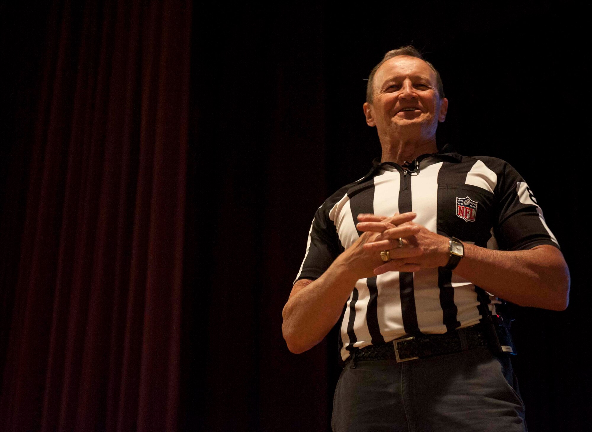 Ed Hochuli, NFL referee, speaks to Airmen at Minot Air Force Base, N.D., June 5, 2015. Hochuli discussed different ways to perform at high levels while under stress and pressure. (U.S. Air Force photo/Airman 1st Class Sahara L. Fales) 