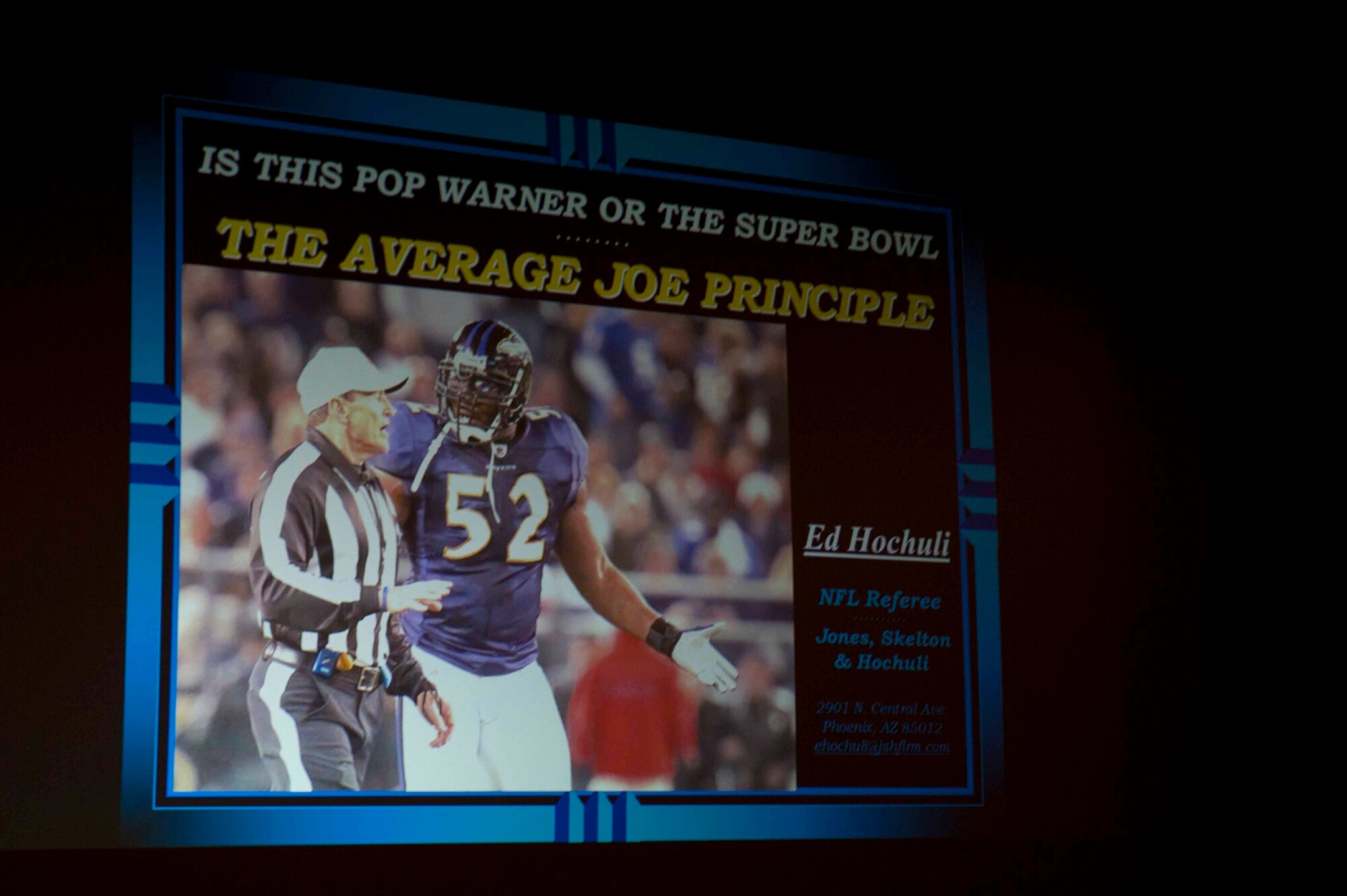 A slide is displayed to the audience at Minot Air Force Base, N.D., June 5, 2015. Ed Hochuli, NFL referee, gave a presentation to Airmen on the importance of resiliency, and how to effectively balance work and life to be successful. (U.S. Air Force photo/Airman 1st Class Sahara L. Fales) 