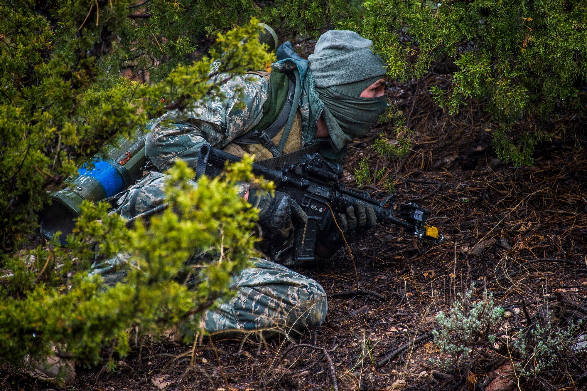Senior Airman Devon Jones, a security forces airman for the 570th Global Mobility Readiness Squadron from Travis Air Force Base, Calif., works as opposing forces to attack a missile convoy from the 91st Missile Wing, assigned to Minot Air Force Base, N.D., during Operation Road Warrior at Camp Guernsey, Wyo., May 19, 2015. 
Operation Road Warrior, the largest security forces exercise conducted each year, is an Air Force Global Strike Command exercise held annually at Camp Guernsey, Wyo., which evaluates tactics, techniques, and procedures used to secure nuclear–capable weapons and critical intercontinental ballistic missile (ICBM) components during convoy operations and provided direct feedback to the three participating ICBM wings; the 91st Missile Wing, assigned to Minot AFB, N.D., 90th Missile Wing assigned to F.E. Warren AFB, Wyo., and 341st Missile Wing assigned to Malmstrom AFB, Mont.. (U.S. Air Force photos by Tech. Sgt. Matthew Hannen)
