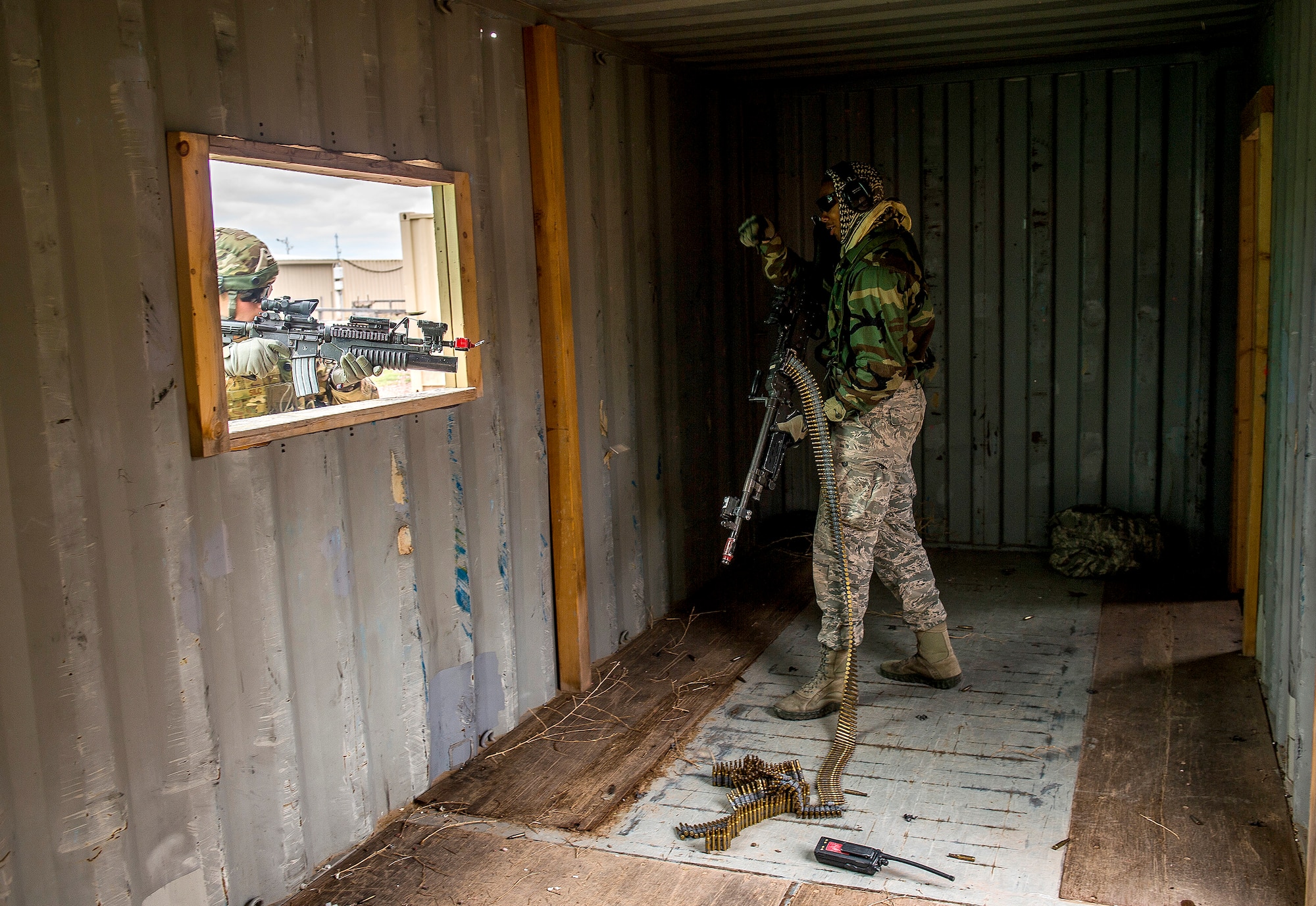 Senior Airman Vidarion McDaniel, a security forces airman for the 570th Global Mobility Readiness Squadron from Travis Air Force Base, Calif., waits to shoot during an attack scenario on a missile convoy while working as opposing forces against the 91st Missile Wing, assigned to Minot Air Force Base, N.D., during Operation Road Warrior at Camp Guernsey, Wyo., May 18, 2015. 
Operation Road Warrior, the largest security forces exercise conducted each year, is an Air Force Global Strike Command exercise held annually at Camp Guernsey, Wyo., which evaluates tactics, techniques, and procedures used to secure nuclear–capable weapons and critical intercontinental ballistic missile (ICBM) components during convoy operations and provided direct feedback to the three participating ICBM wings; the 91st Missile Wing, assigned to Minot AFB, N.D., 90th Missile Wing assigned to F.E. Warren AFB, Wyo., and 341st Missile Wing assigned to Malmstrom AFB, Mont.. (U.S. Air Force photos by Tech. Sgt. Matthew Hannen)
