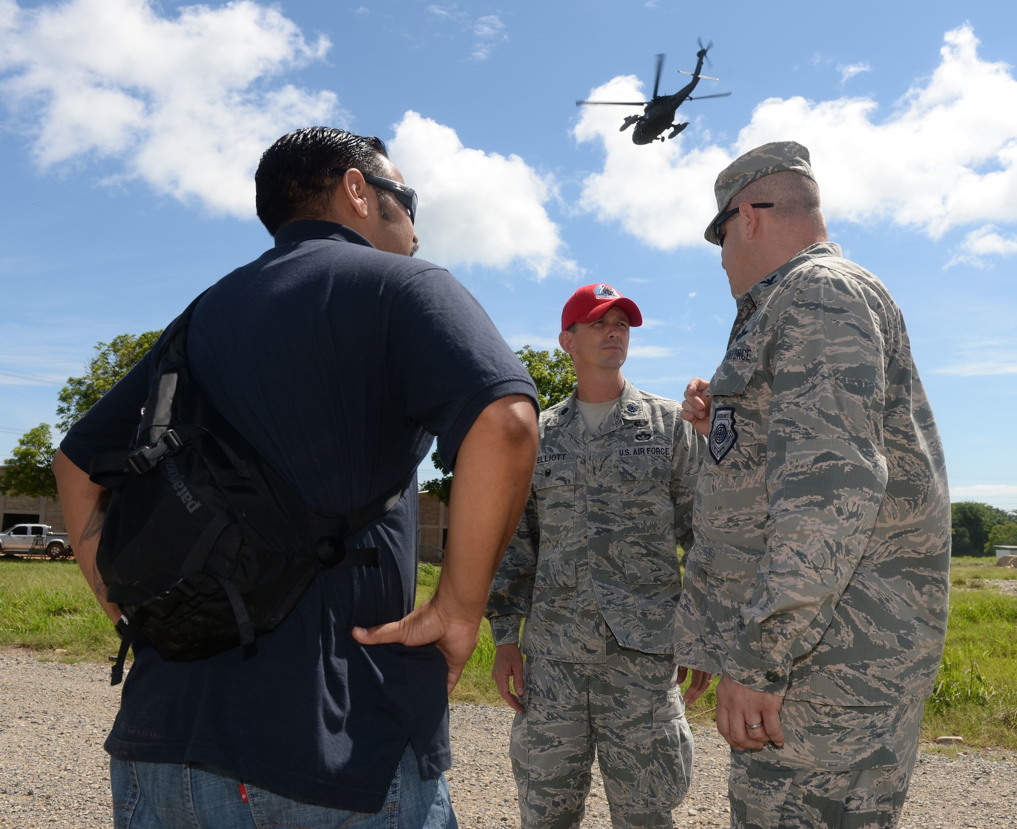 U.S. Air Force Col. James Sheedy, 474th Air Expeditionary Group and 612th Theater Operations Group commander, talks with U.S. Air Force Lt. Col. Ryan Elliott, 823rd RED HORSE Squadron commander and NEW HORIZONS Honduras 2015 exercise commander, out of Hurlburt Field, Fla., at the Puerto Castillo Naval Base in Trujillo, Honduras, June 10, 2015. Sheedy oversees THE NEW HORIZONS exercise and visited exercise personnel at the Honduras Aguan well, Gabriela Mistral primary school construction site, and Dr. Salvador Paredos Hospital. “Whenever one of these operations comes up to the command and control chain that have to attach it to a unit or build a unit, we have a unit, the 474th Air Expeditionary Group, to I get to be the commander and oversee the command and control,” said Sheedy.  Sheedy also visited exercise personnel at the Honduras Aguan well site, Gabriela Mistral primary school construction site, and saw the Dr. Salvador Paredos Hospital. Launched in the 1980’s, NEW HORIZONS is an annual joint humanitarian assistance exercise conducted by U.S. Southern Command with a partner nation in Central America, South America or the Caribbean. The exercise improves joint readiness training of U.S. and partner nation civil engineers, medical professionals and support personnel.  (U.S. Air Force photo by Capt. David J. Murphy/Released)
