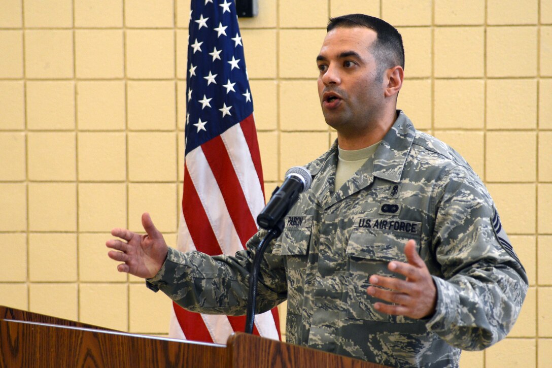 U.S. Air Force Chief Master Sgt. Orlando Pabon, 633rd Medical Group superintendent, speaks to the U.S. Air Force technical sergeant selects, their family, friends, coworkers and other attendees about the responsibilities of being a technical sergeant at Langley Air Force Base, Va., June 9, 2015. He said that part of the reason the selects earned the rank was because they had already begun working like technical sergeants. (U.S. Air Force photo by Airman 1st Class Devin S. Michaels/Released)