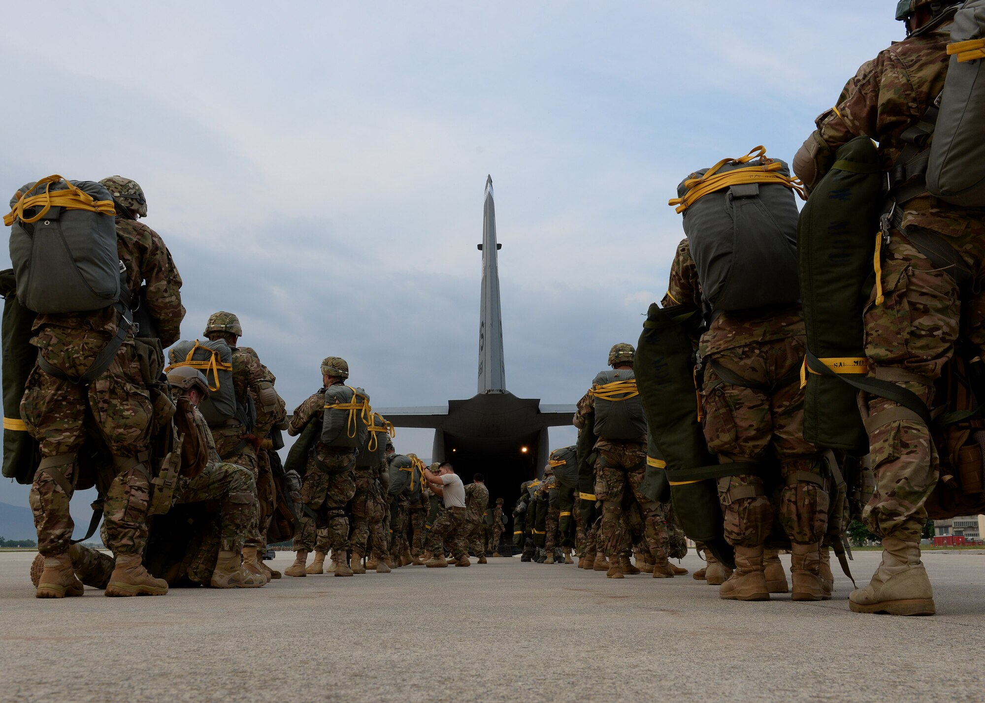 U.S. Army paratroopers from the 173rd Airborne Brigade, Vicenza, Italy load into a C-17 Globemaster III at the Personnel Alert Holding Area, June 9, 2015, at Aviano Air Base, Italy. The U.S. Army and German Armed Forces deployed to Lithuania for a five-month joint training exercise. (U.S. Air Force photo by Airman 1st Class Cary Smith/Released)