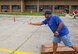 Members of the 132d Wing (132WG), Des Moines, Iowa and their families participate in the 2015 Annual Family Day held at the 132WG on Saturday, June 6, 2015. Master Sergeant Ken Williams competes in the corn hole tournament during the 2015 Wing Family Day at the 132d.  (U.S. Air National Guard photo by Senior Airman Michael J. Kelly/Released)