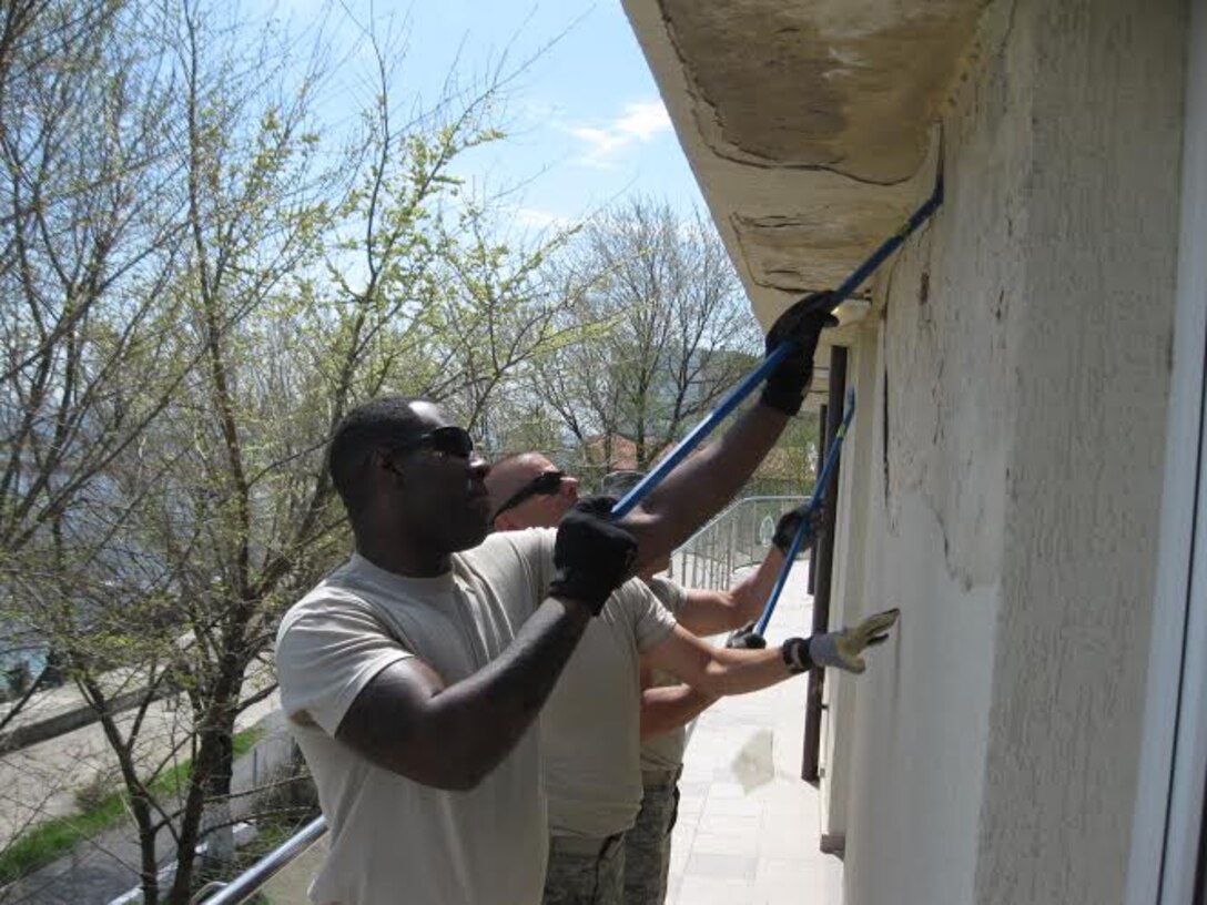 Alabama Guardsmen from the 117th Air Refueling Wing Civil Engineering Squadron renovate a Romanian medical clinic as part of a Deployment for Training mission April 2015 .  (Courtesy Photo/Released)