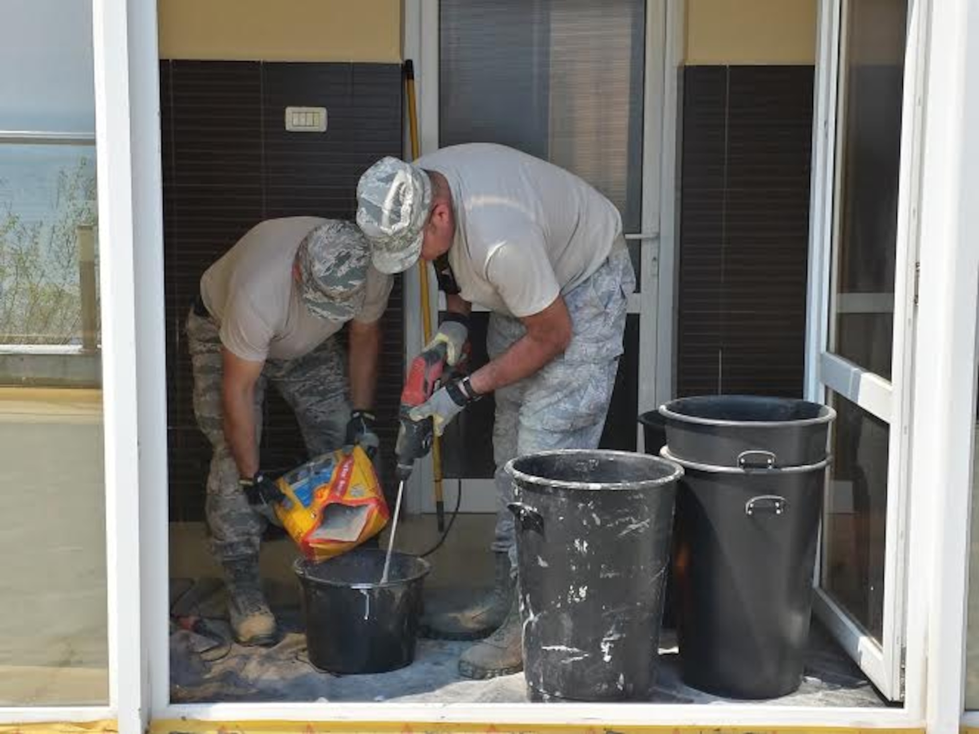 Alabama Guardsmen from the 117th Air Refueling Wing Civil Engineering Squadron renovate a Romanian medical clinic as part of a Deployment for Training mission April 2015 .  (Courtesy Photo/Released)