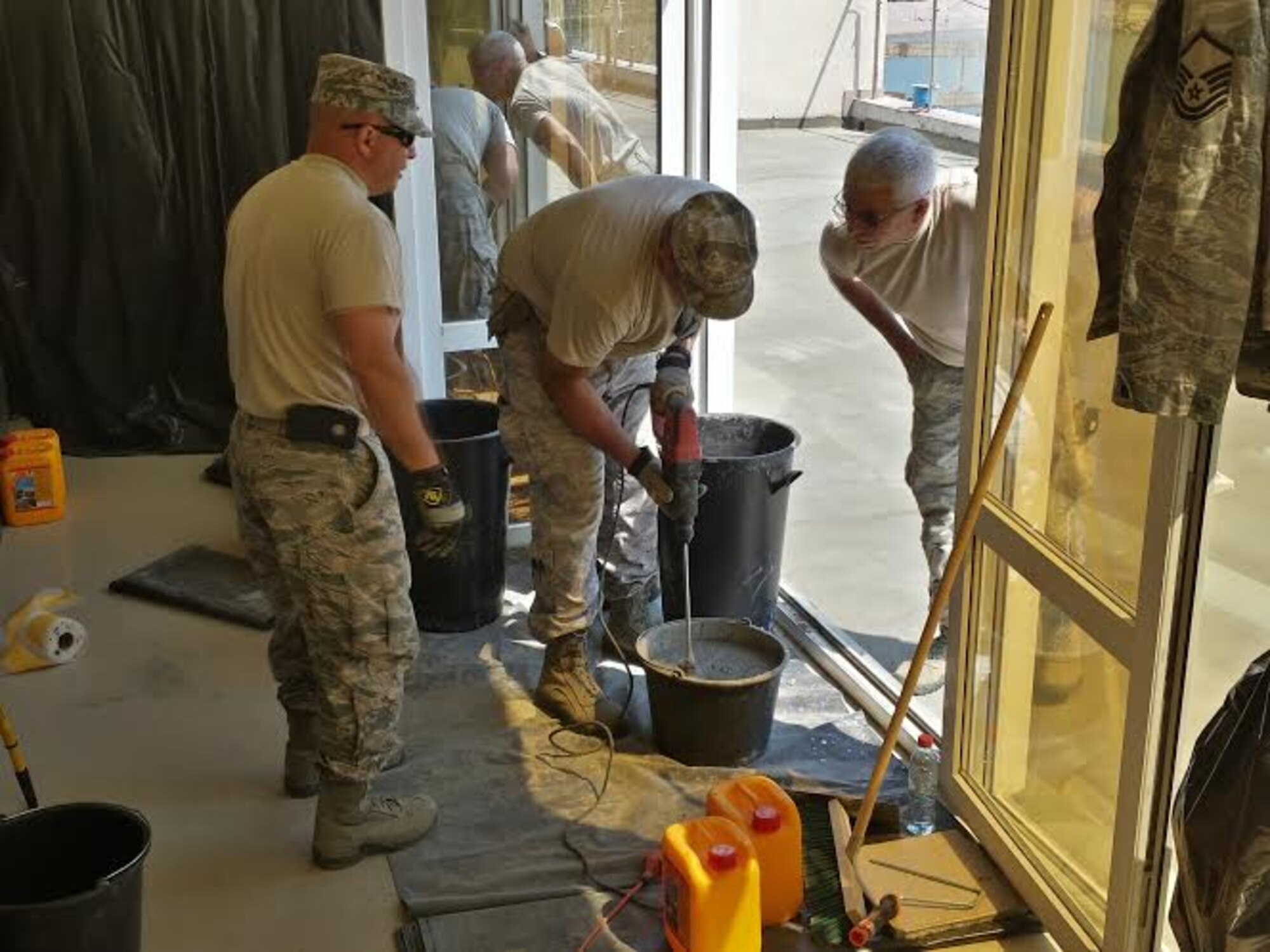 Alabama Guardsmen from the 117th Air Refueling Wing Civil Engineering Squadron renovate a Romanian medical clinic as part of a Deployment for Training mission April 2015 .  (Courtesy Photo/Released)