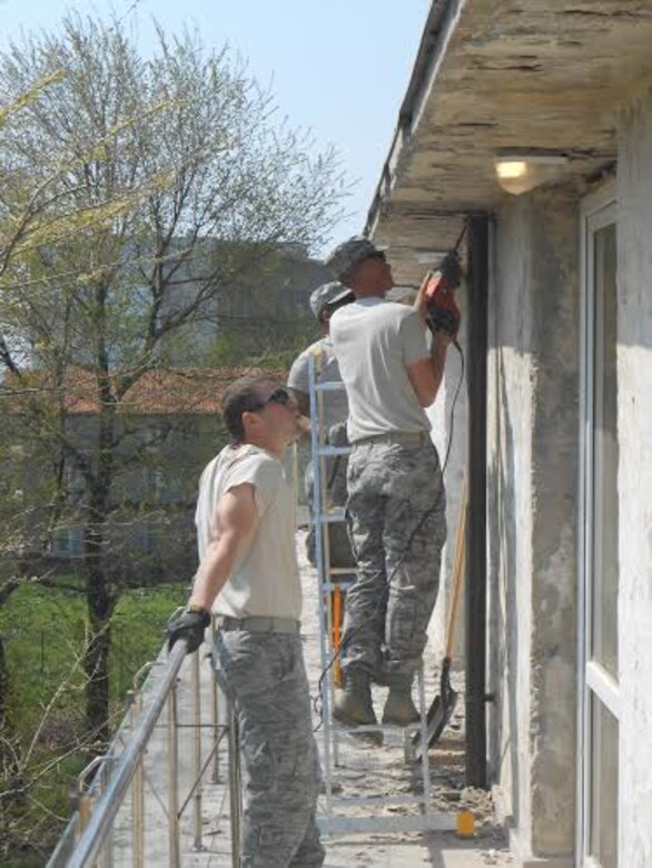 Alabama Guardsmen from the 117th Air Refueling Wing Civil Engineering Squadron renovate a Romanian medical clinic as part of a Deployment for Training mission April 2015 .  (Courtesy Photo/Released)