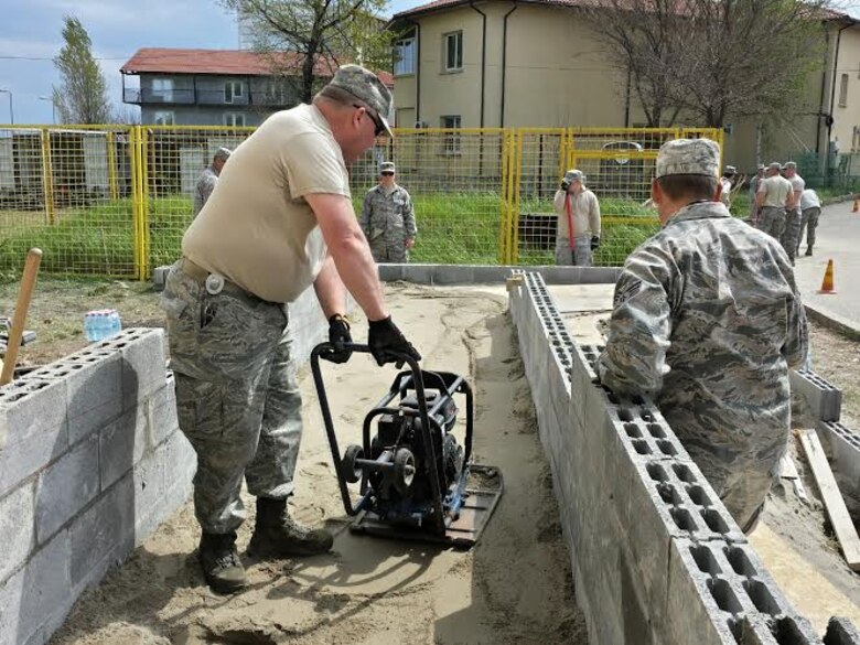 Alabama Guardsmen from the 117th Air Refueling Wing Civil Engineering Squadron renovate a Romanian medical clinic as part of a Deployment for Training mission April 2015 .  (Courtesy Photo/Released)
