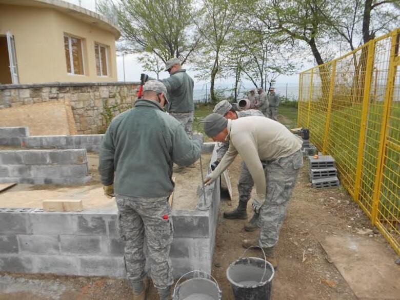 Alabama Guardsmen from the 117th Air Refueling Wing Civil Engineering Squadron renovate a Romanian medical clinic as part of a Deployment for Training mission April 2015 .  (Courtesy Photo/Released)