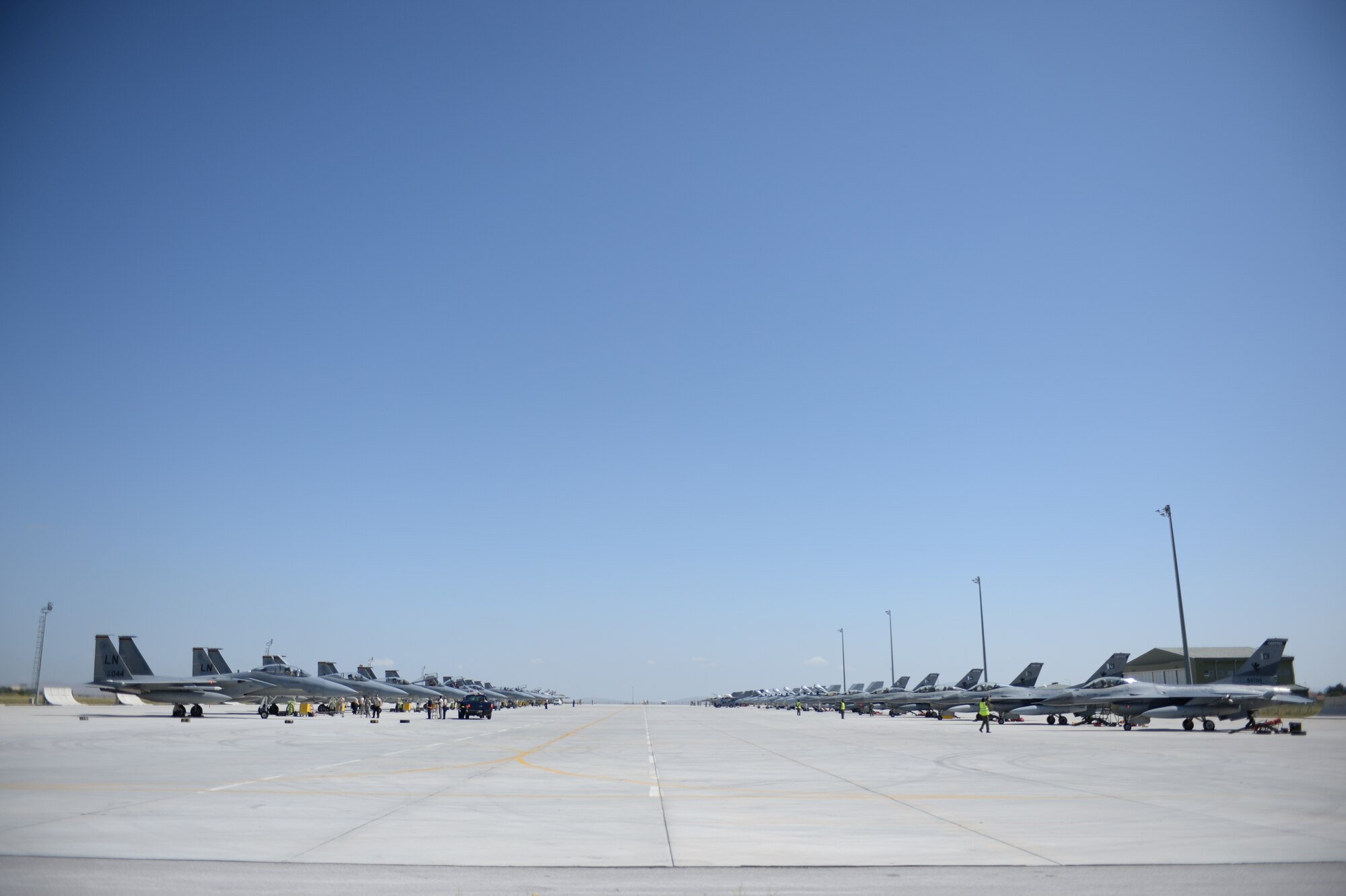 Aircraft from air forces of the U.S., U.K., Turkey, Spain, and Pakistan sit on the tarmac at 3rd Main Jet Base, Turkey, prior to a mission during Anatolian Eagle 15 at 3rd Main Jet Base, Turkey, June 10, 2015. Anatolian Eagle is a two-week flying training exercise involving U.S. Air Forces in Europe units and multiple NATO partners. (U.S. Air Force photo by Tech. Sgt. Eric Burks/Released)
