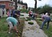 NATO and 425th Air Base Squadron members plant flowers at a local girls’ care and rehabilitation center garden as part of a landscaping project June 6, 2015. (U.S. Air Force photo by Tanju Varlikli/released)
