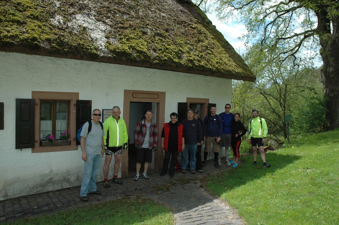 A group of Explore the Eifel bikers and walkers followed an invitation by Mayor Illigen and the bike tour organizer, Thomas Gruber,  explored  the small museum and other attractions. The Peter Zirbes House and Museum attracts people year-round and will be open to visitors at 2 p.m. Sunday, June 14, 2015. Local village residents will read poems from Peter Zirbes to visitors. . The Peter Zirbes House shows the original household environment with items from the past, giving visitors a good impression on how the poet lived and worked. (Courtesy photo)