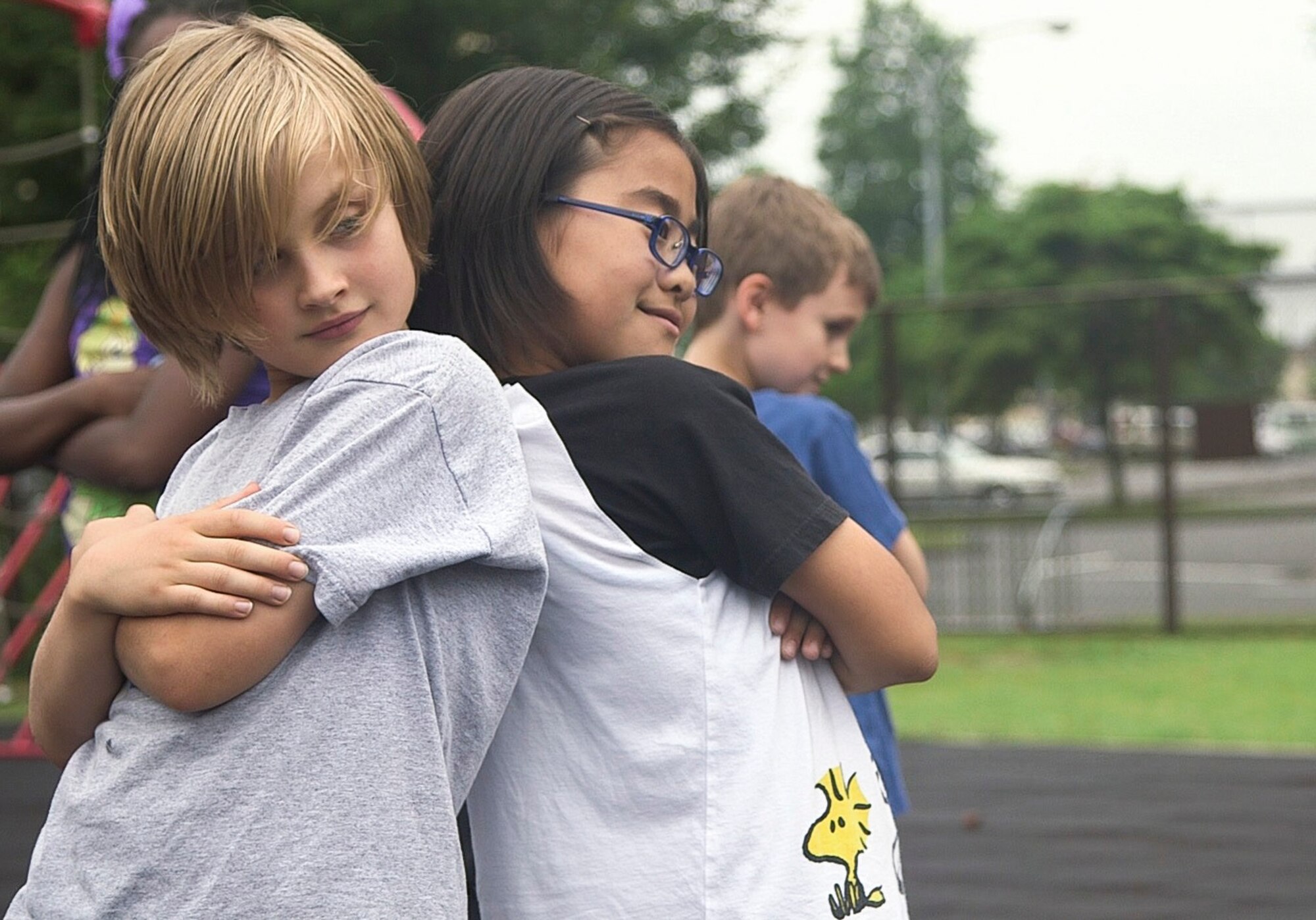 Students from Yokota West Elementary School pose after completing a performance to raise awareness for the Recess Before Lunch program at Yokota Air Base, Japan, June 2, 2015. The program allows students to get involved in physical activity prior to consumption of nutrients. (U.S. Air Force photo by Staff Sgt. Dustin Payne/Released)