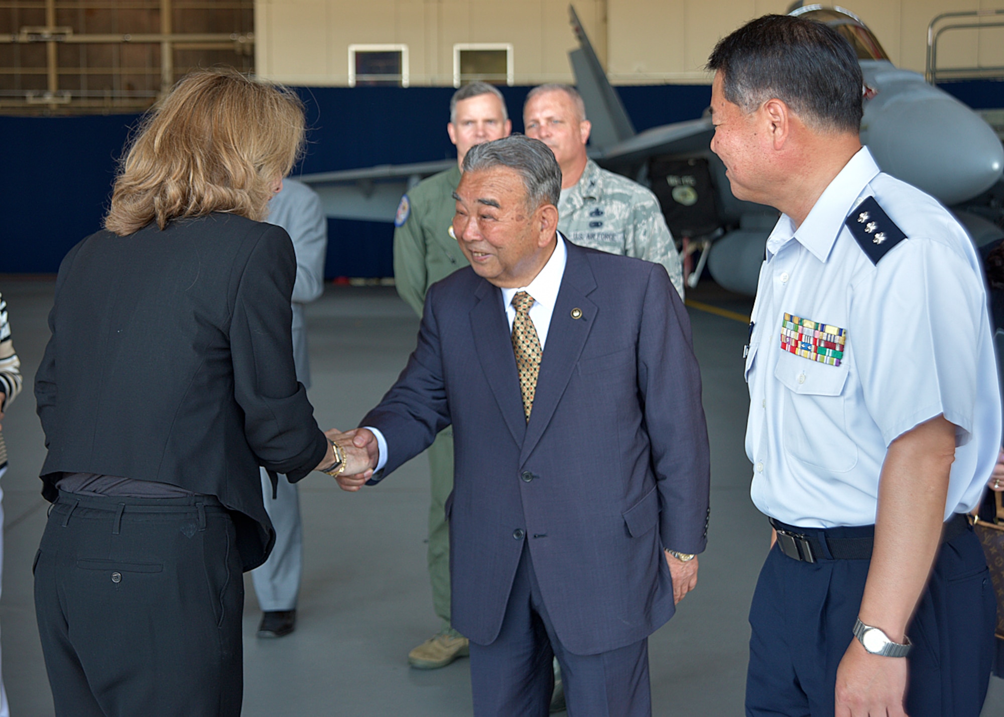 U.S. Ambassador to Japan, Caroline Kennedy thanks Misawa Mayor, Kazumasa Taneichi, for his contribution in hosting and supporting the U.S. military at Misawa Air Base, Japan, June 11, 2015. She attributed the strength of the U.S.-Japan alliance today to the continued partnership from local leaders, like Taneichi, across Japan. (U.S. Air Force photo by Senior Airman Jose L. Hernandez-Domitilo/Released)