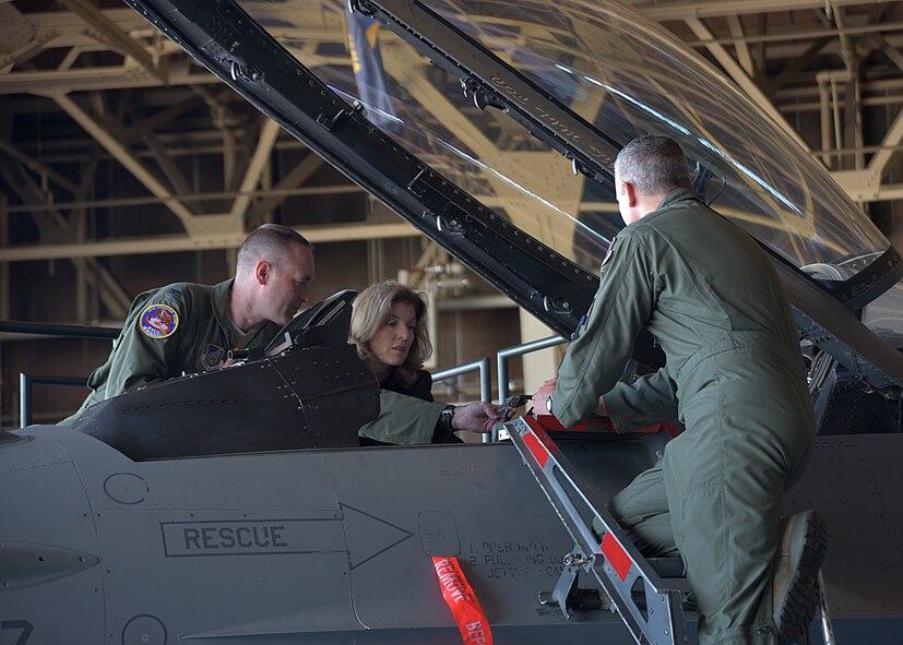 U.S. Air Force Col. Tim Sundvall, 35th Fighter Wing commander, briefs U.S. Ambassador to Japan Caroline Kennedy on the different functions inside the cockpit of F-16 Fighting Falcon at Misawa Air Base, Japan, June 11, 2015. As part of the Ambassador’s first trip to the Aomori Prefecture, Kennedy visited with the U.S. military and families, as well as with Japan Air Self-Defense Force members stationed at Misawa Air Base. (U.S. Air Force photo by Senior Airman Jose L. Hernandez-Domitilo/Released) 
