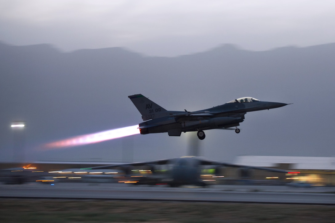 U.S. Air Force Capt. Doug Mayo pilots an F-16 Fighting Falcon during takeoff from Bagram Airfield, Afghanistan, June 8, 2015. Mayo is a pilot assigned to the 555th Expeditionary Fighter Squadron.