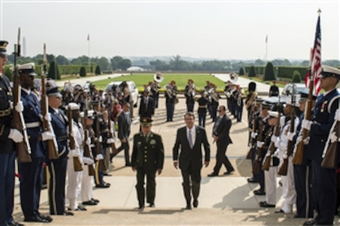 U.S. Defense Secretary Ash Carter welcomes Chinese Gen. Fan Changlong, vice chairman of China's Central Military Commission, with an enhanced honor cordon at the Pentagon, June 11, 2015. The two leaders met to discuss matters of mutual importance.