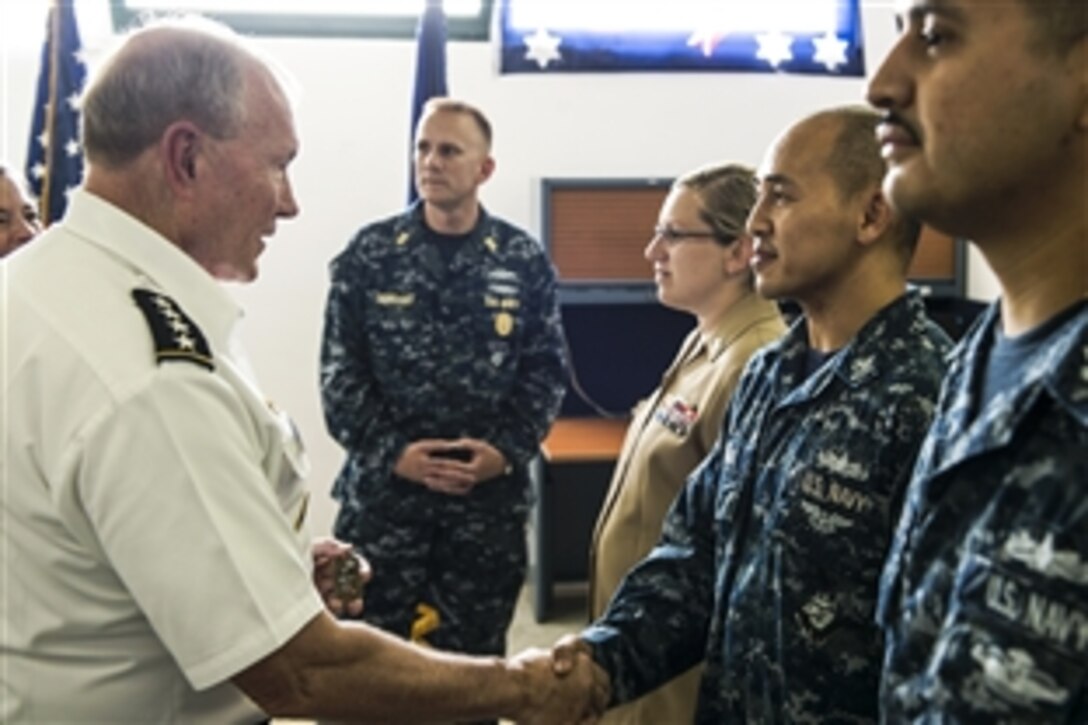 U.S. Army Gen. Martin E. Dempsey, chairman of the Joint Chiefs of Staff, meets sailors identified by their command for exceptional work on Naval Support Activity Naples, Italy, June 11, 2015.
