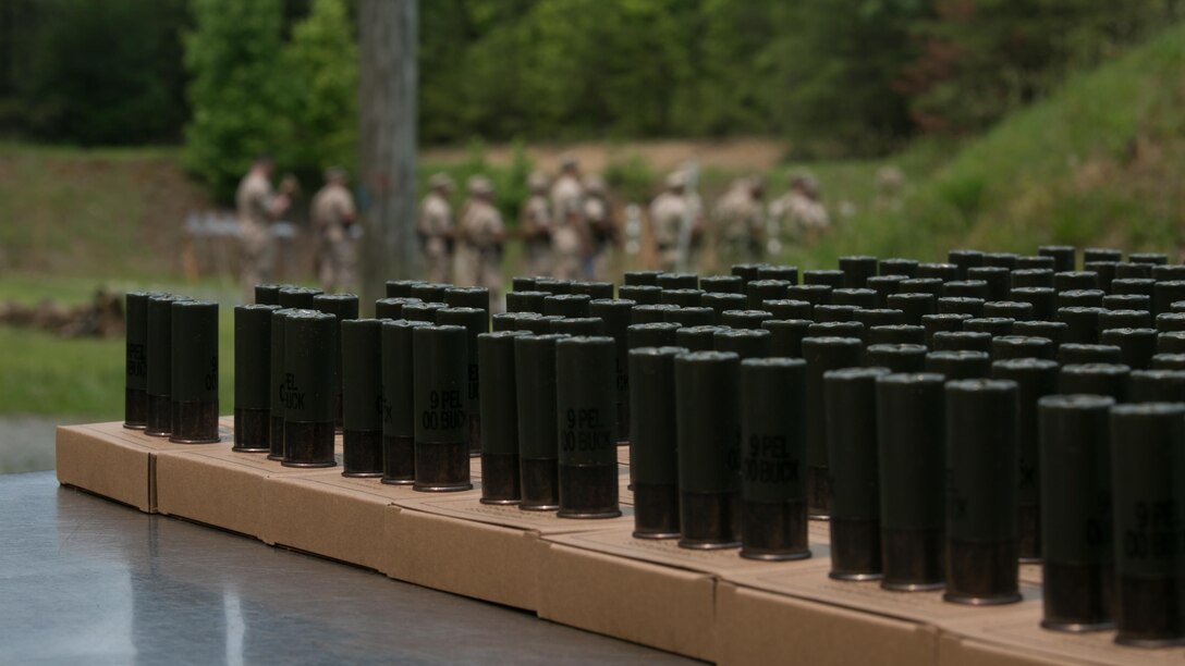 M1014 shotgun ammunition is staged during a training exercise at Range 5, Marine Corps Base Quantico, Virginia, June 10, 2015. 1st platoon, Guard Company, traveled there to increase overall marksmanship with the M9 service pistol, the M4 service rifle and M1014 shotgun. 