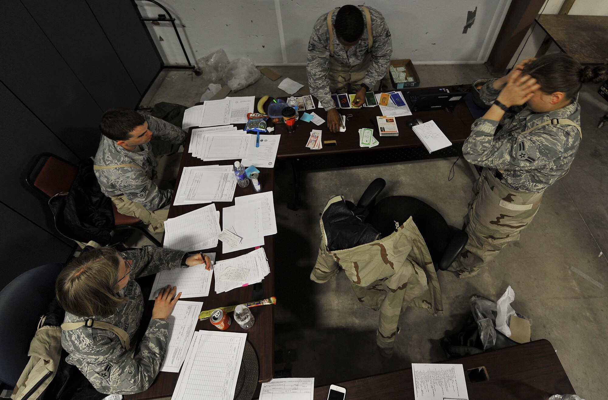 Airmen from Eglin Air Force Base, team ‘Bounty Hunters,’ assigned to the 96th Comptroller Squadron, inventory their resources during the Financial Management Warrior exercise on Hurlburt Field, Fla., June 6, 2015. The exercise is based on ‘Top Dollar,’ a finance exercise from the 1990’s, and is anticipated to become an annual or semi-annual training event for Eglin and Hurlburt Airmen. (U.S. Air Force photo/Airman Kai White)