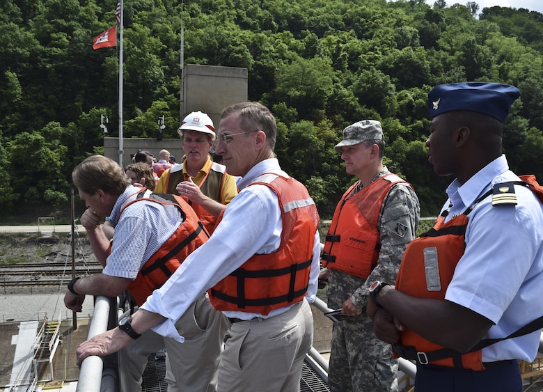 The tour group including Chairman Mike Simpson (left), House Energy and Water Development Appropriations Subcommittee, Congressman Tim Murphy (middle), and Col. Bernard Linstrom, U.S. Army Corps of Engineers Pittsburgh District commander, take a bird's-eye view of Charleroi Locks and Dam 4 on the Monongahela River, June 5.  