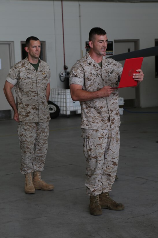 With another chevron on his collar, Cpl. Daniel Jacobs reads the noncommissioned officer’s creed to the Marines with Marine Fighter Attack Squadron 312, in the squadron’s hangar aboard Marine Corps Air Station Beaufort, June 2. He has just been meritoriously promoted to a corporal of Marines, and can now build his leadership skills as a new NCO. Jacobs is an ordnance technician with VMFA-312, Marine Aircraft Group 31.