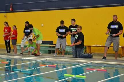 150530-N-ER677-008 - Over 500 students on 140 teams from across the United States and Puerto Rico competed at the National SeaPerch Challenge. Participants used remotely operated vehicles (ROV) to compete in either the stock division or the open division.  
