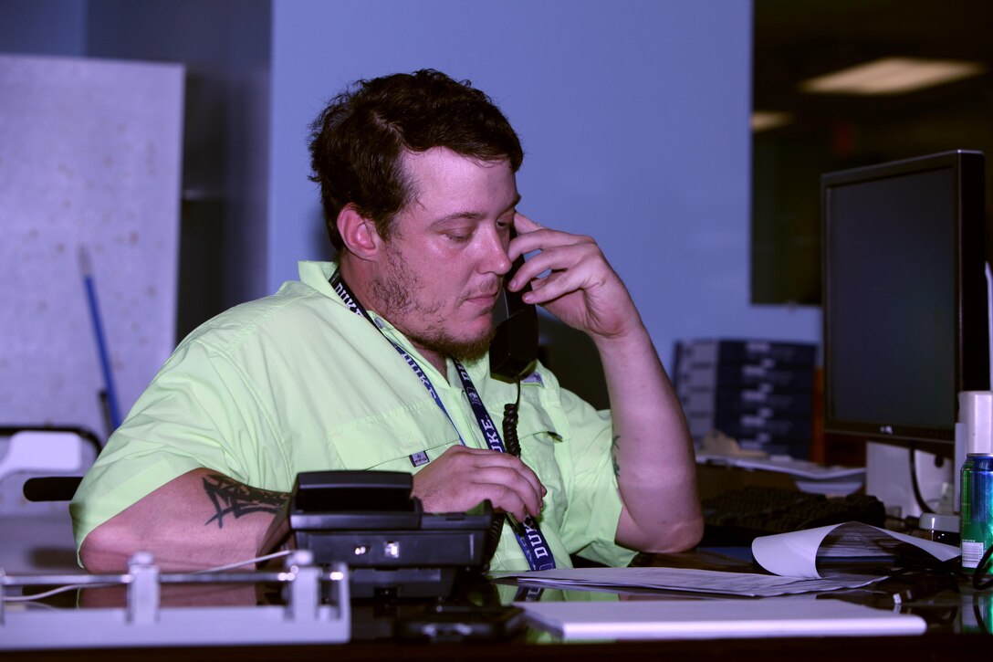 David M. Duncan, a Protégé Day participant, calls for a delivery of shop materials for the Public Works Department warehouse during the third annual Protégé Day at Marine Corps Air Station Cherry Point, N.C., June 11, 2015.