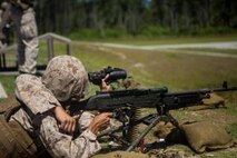 A Marine with Support Company, 8th Engineer Support Battalion, fires an M240B light machine gun at targets while his assistant gunner instructs him on what adjustments to make during a machine gun range at the Golf 21 range aboard Camp Lejeune, N.C., June 11, 2015. All Marines, no matter their military occupational specialty, need to be proficient with Marine Corps weapon systems to use in any clime or place. (U. S. Marine Corps photo by Cpl. Shawn Valosin)