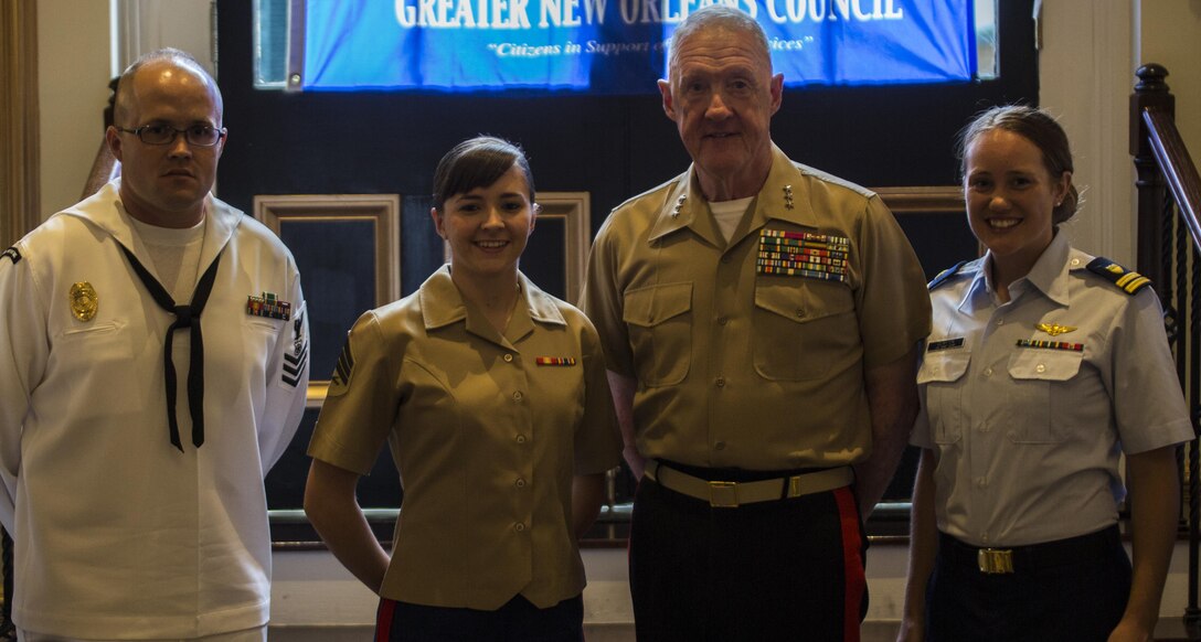 Service members who were recognized at the New Orleans Chef’s Salute to our Armed Forces hosted by the Navy League at the Bourbon Orleans Hotel, June 11, 2015, pose for a picture with Lt. Gen. Richard P. Mills (center right), commander of Marine Forces Reserve and Marine Forces North. The New Orleans Chef’s Salute to our Armed Forces has been hosted for five years, showcasing local chefs’ military appreciation by serving them specialty entrees and recognizing the enlisted service members of the year for each respective branch of the U.S. armed forces. 