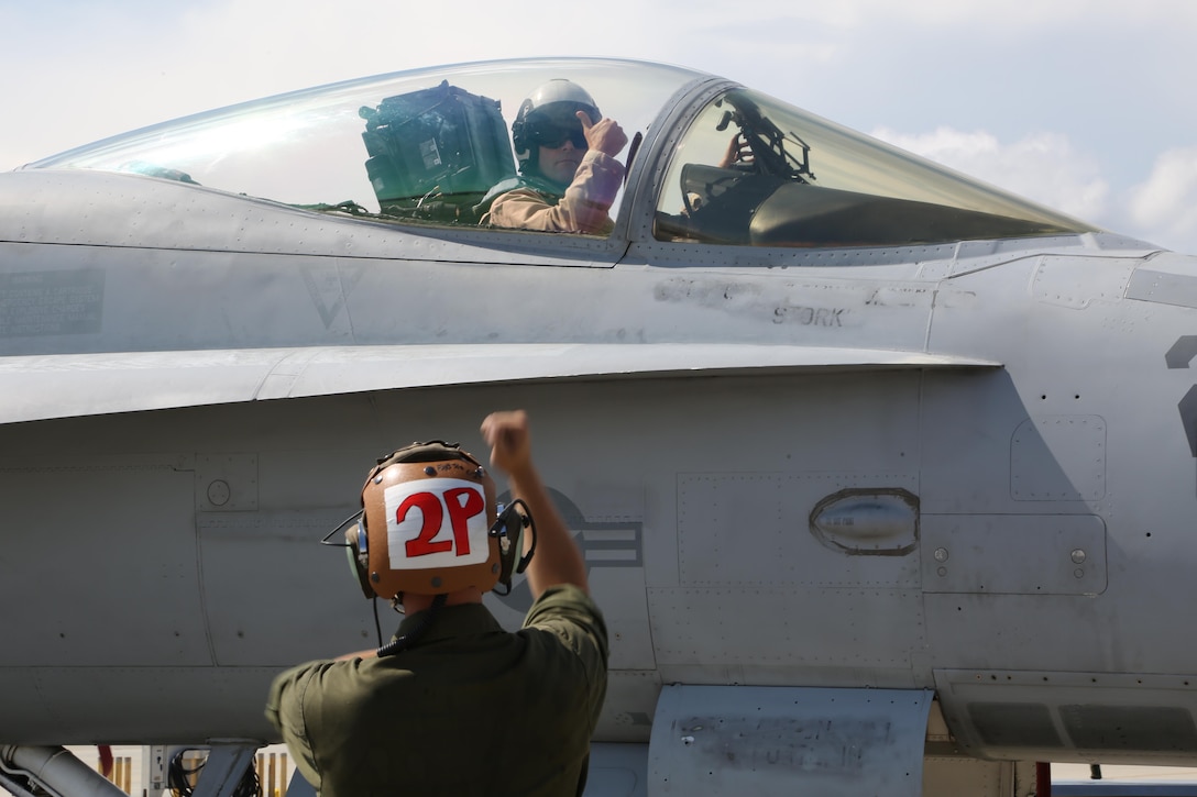 Col. William “Beavis” Lieblein made his final flight in an F/A- 18 Hornet as the commanding officer of Marine Aircraft Group 31, June 9. Lieblein gets the thumbs up to take the Hornet to the skies from the Marines on the ground. Lieblein is the CO of MAG-31 aboard Marine Corps Air Station Beaufort.