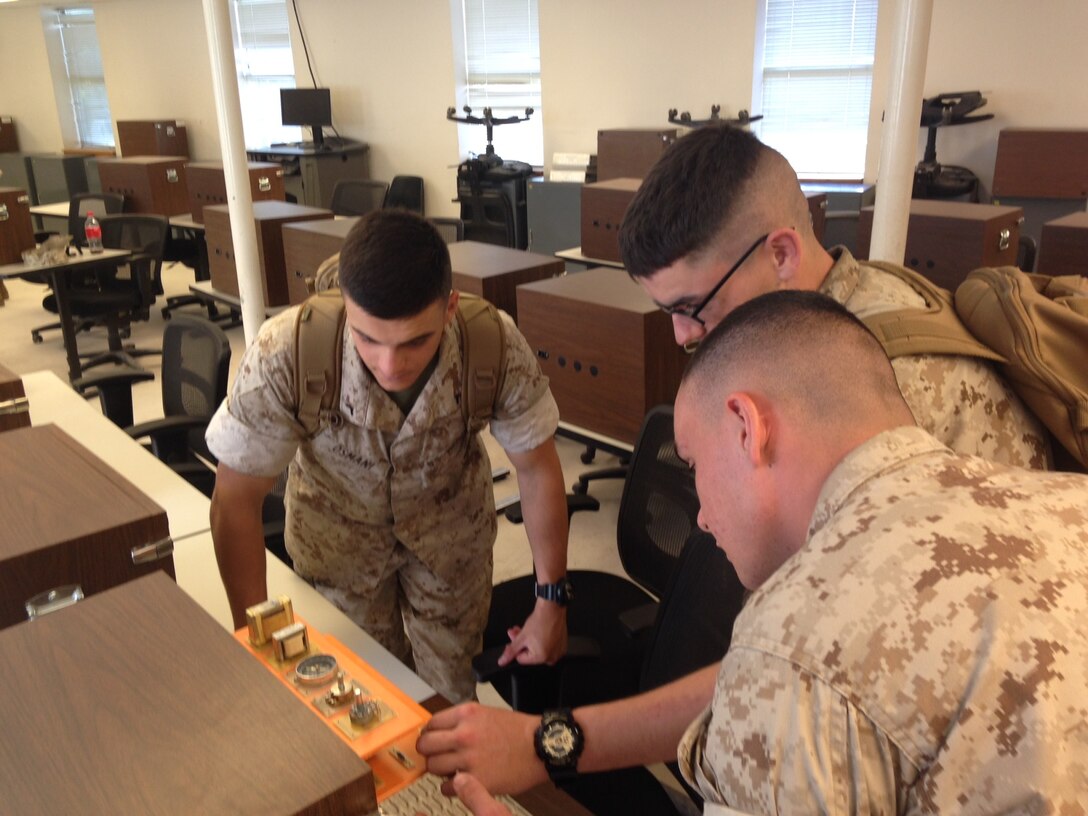 Marines from BEEEST 7-15 conduct practical application on AC theory.