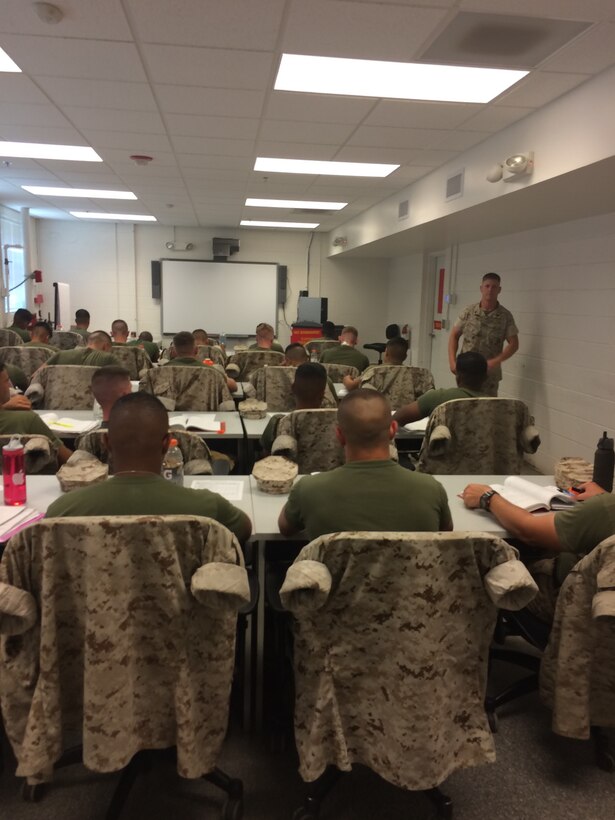 Marines from BE 6-15 learn about tools and SL-3 inventory.