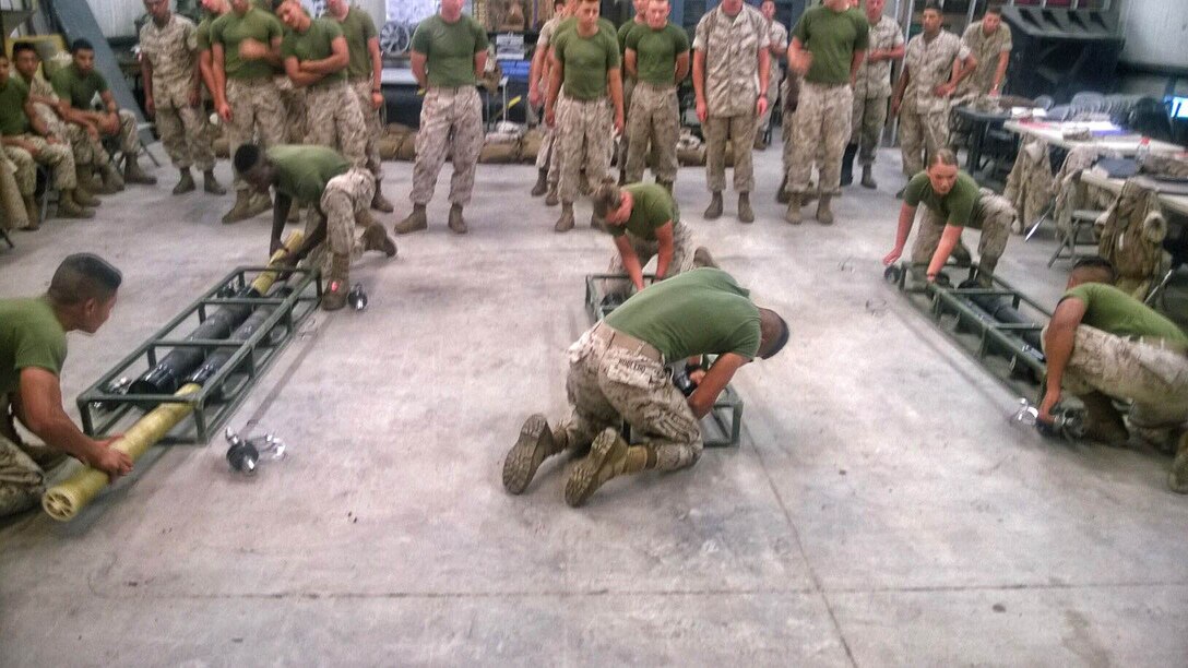 Marines from BWST 6-15 conduct training on repairing the reverse osmosis element of the LWPS.