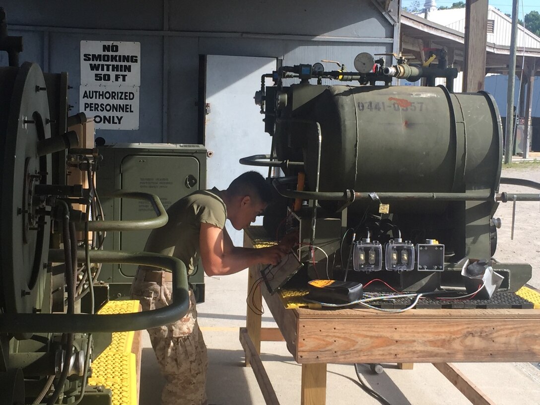 A Marine from BEEEST 6-15 conducts a performance test on an M-80.