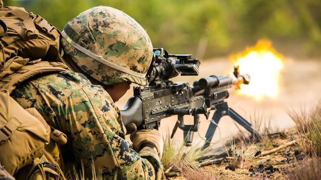 Lithuanian forces are teamed with U.S. Marines from the Black Sea Rotational Force during Exercise Saber Strike at the Pabrade Training Area, Lithuania, June 9, 2015. The exercise brings NATO allies and other partner nations together in eastern Europe for a multilateral training event designed to promote regional stability and security, strengthen partnerships, and foster trust.