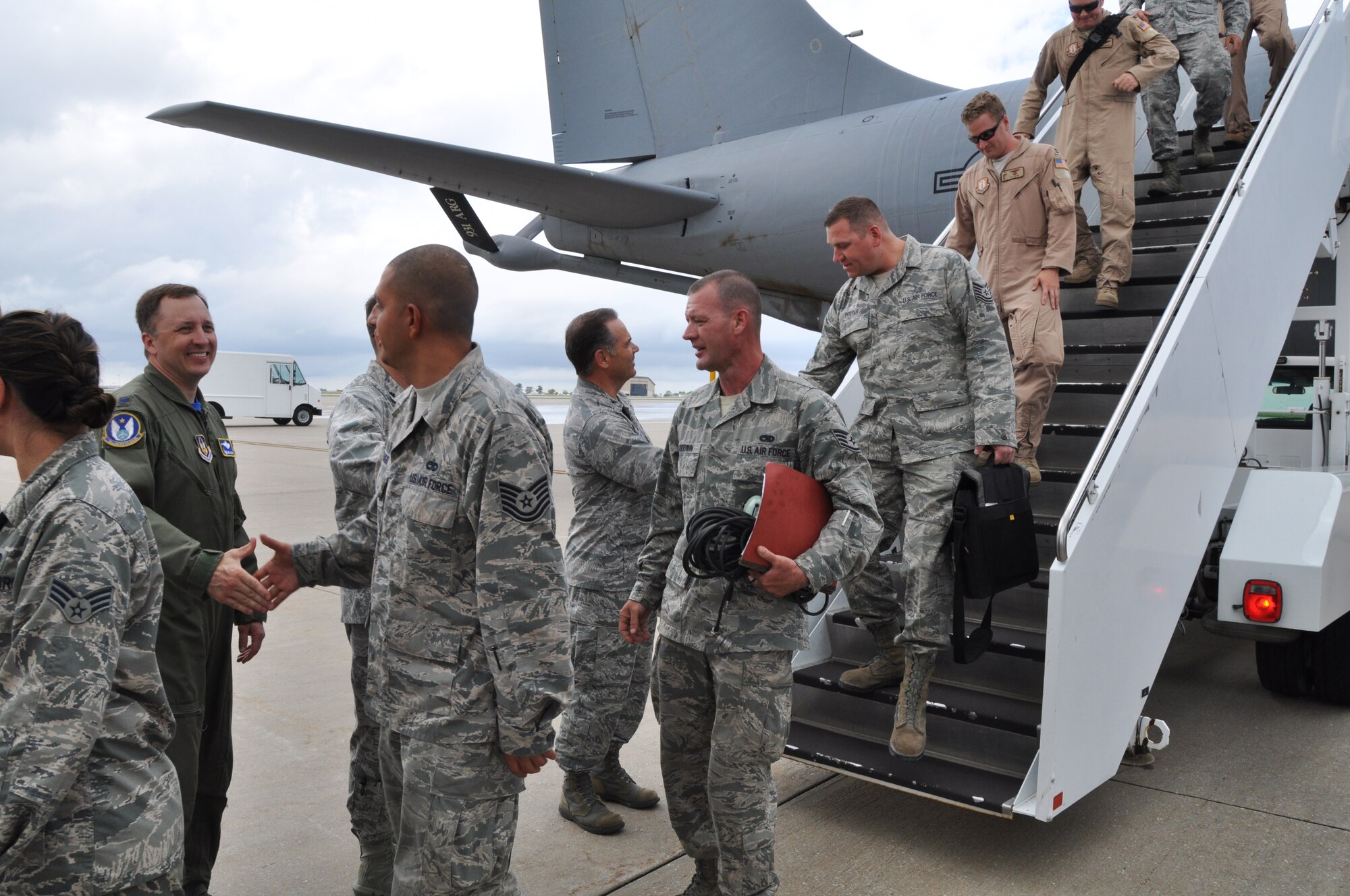 McConnell leaders greet more than 20 members of the 931st Air Refueling Group as they return from a deployment to Southwest Asia, June 12, 2015, at McConnell Air Force Base, Kan. During the deployment, the 931 ARG performed aircraft maintenance and filled other support roles.  (U.S. Air Force photo by Tech. Sgt. Abigail Klein)