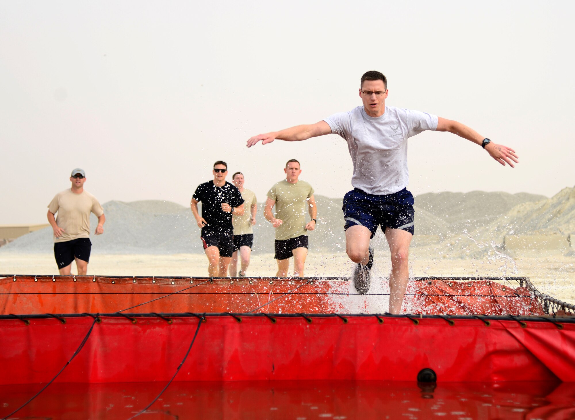 Tech. Sgt. Sean P. McGahuey, 512th Force Support Squadron, participates in a physical training event May 2, 2015, while deployed to Southwest Asia. The knowledge manager is assigned to the 386th Air Expeditionary Wing, and as a physical training leader, has conducted three wing-wide physical fitness assessments. (Courtesy photo)