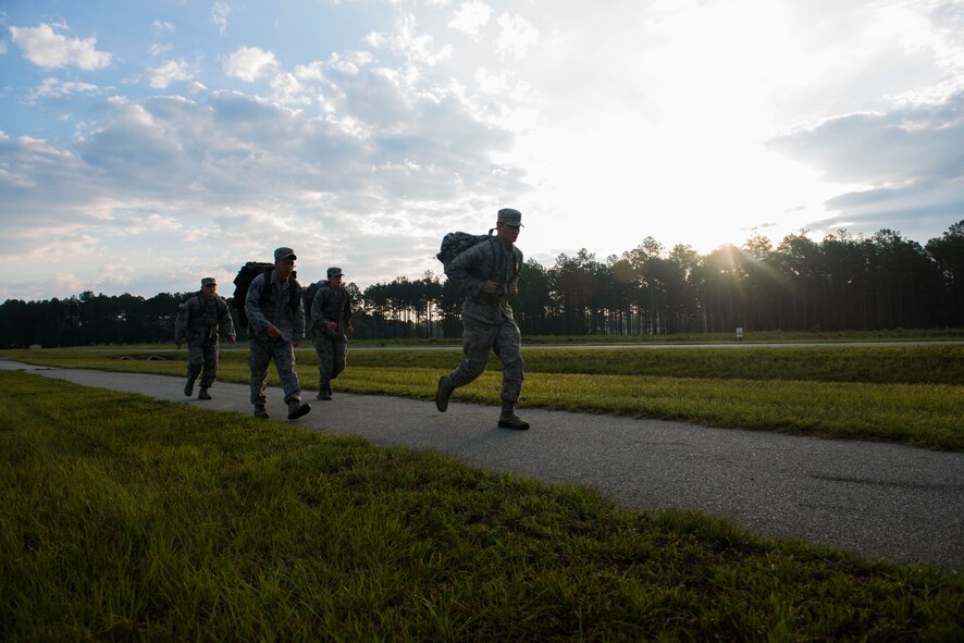 Cadets from the U.S. Air Force Academy, Colo., participate in the 820th Base Defense Group’s weekly ruck march June 5, 2015, at Moody Air Force Base, Ga. Cadets flew in an HC-130J Combat King II and had a firsthand look at the 820th BDG airborne jump and 71st Rescue Squadron training missions following the march. (U.S. Air Force photo by Airman 1st Class Dillian Bamman/Released)