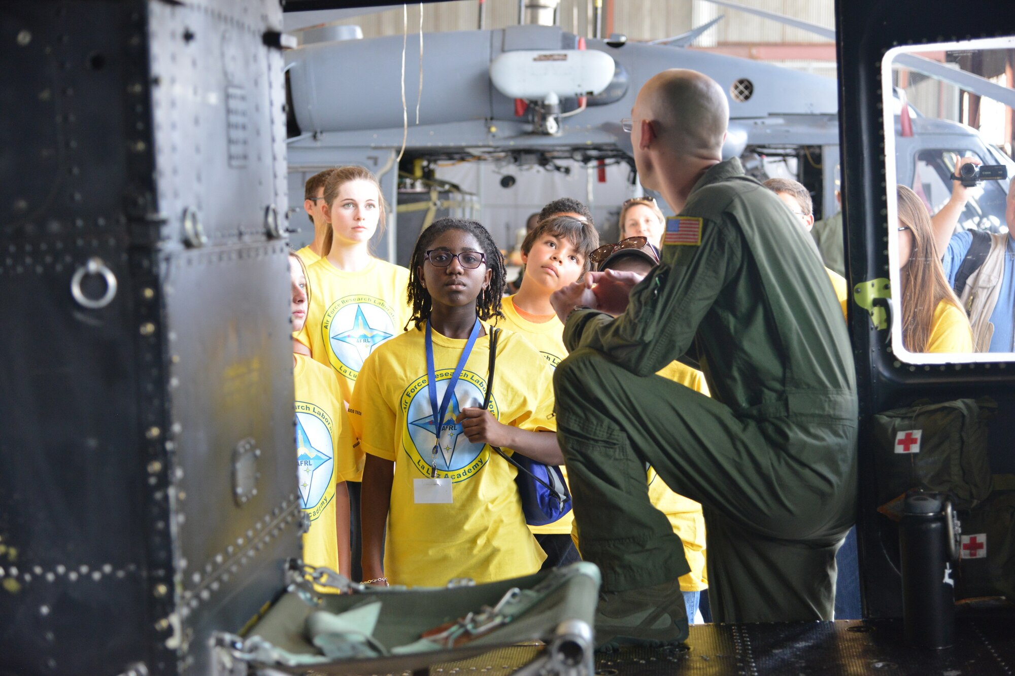 Students from the La Luz Academy's Aviation Camp visit the flightline and learn from pilots in the 58th Special Operations Wing about the aircraft being flown by the unit. (Photo by Todd Berenger)