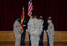 Lieutenant Colonel Dennis Major (left) assumes command of the 841st Transportation Battalion from LTC Brian Memoli during a change of command ceremony, June 12, 2015 at Joint Base Charleston – Weapons Station, S.C. Colonel Jason Vick, 597th Transportation Brigade commander out of Fort Eustis, Va., presided over the ceremony. Memoli is headed to the Army Business Transformation Office at the Pentagon in Washington, D.C. (U.S. Air Force photo/Staff Sgt. AJ Hyatt) 
